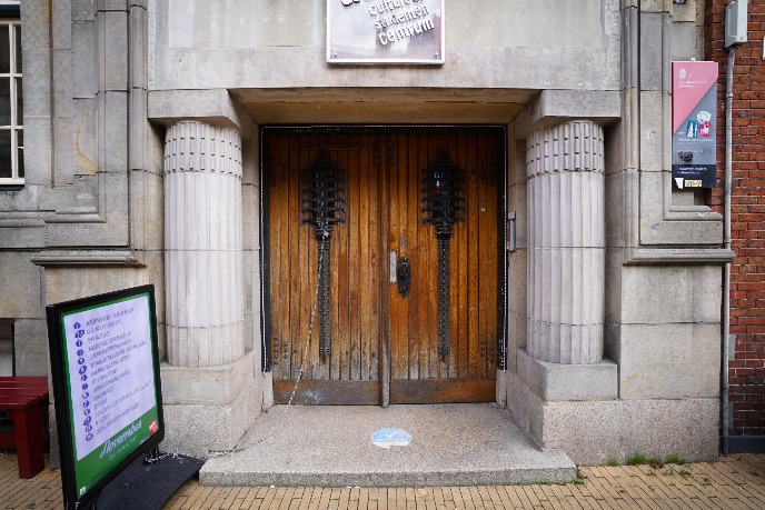 Main entrance of the building, including treshold