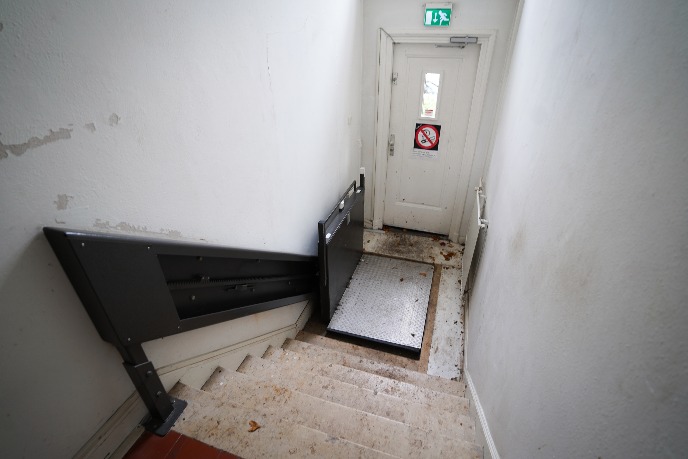 Stairlift for wheelchair users at back entrance