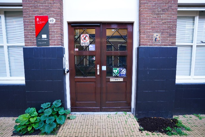 Main entrance of the building, push button at the left side