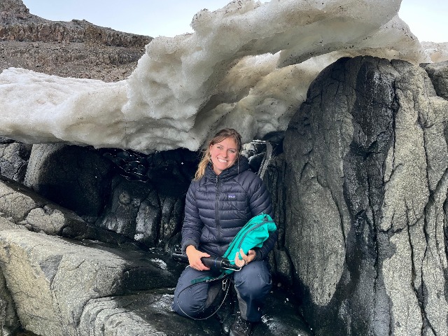 Svennie Stephenson posing in Antarctica