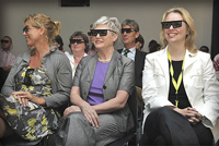 Minister van der Hoever with a pair of 3D glasses