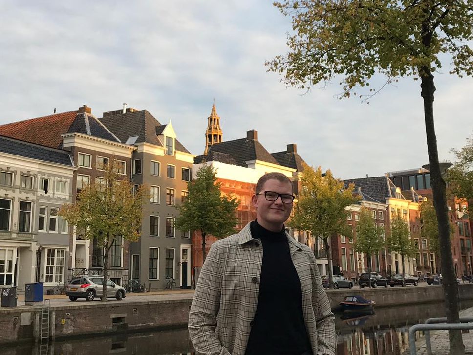 Luc posing by one of Groningen's canals.