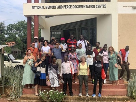 Participants standing in front of National Memory and Peace Documentation Centre