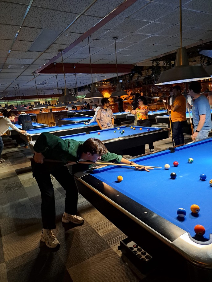 BMBD group members playing pool