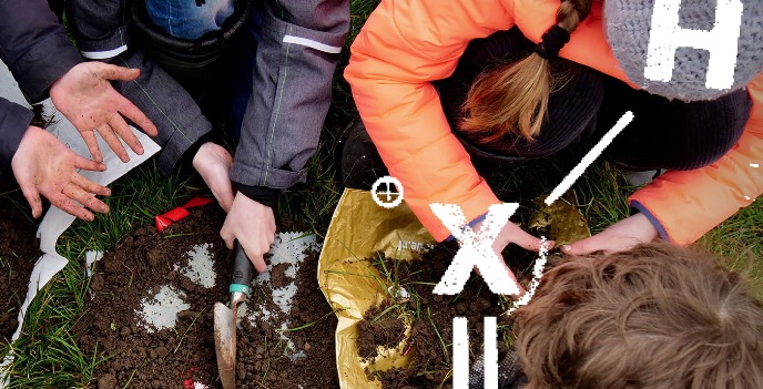 Citizen scientists digging in the ground